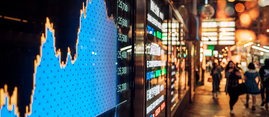 Digital signs along a sidewalk.